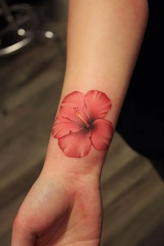 How about adding some Hawaiian vibes on your arm? This red hibiscus looks so realistic that you have to try it!