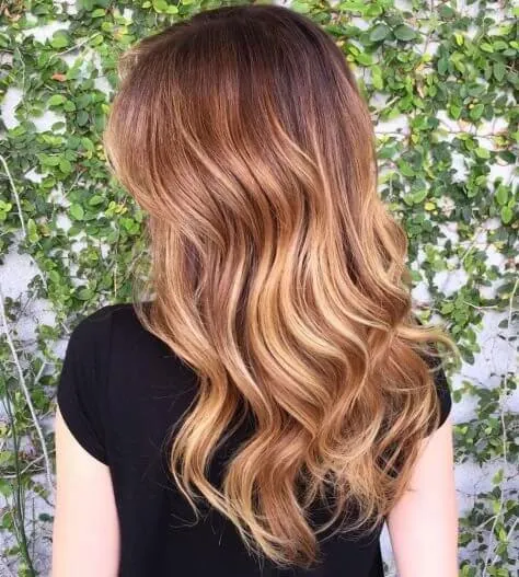 Multi-colored waves look amazing if you have thick and long hair.