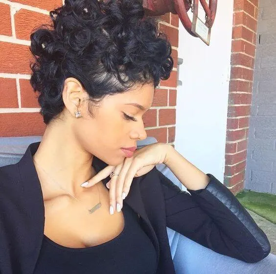 Curly pixie cuts also look great with longer layers on top