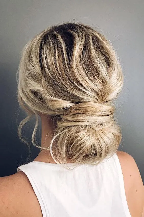 Use your hair to wrap your low bun