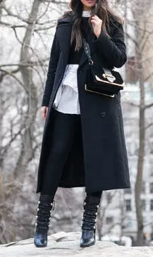 Here is an outfit of masculine items worn in an elegantly feminine, preppy way. Get the same effect by wearing slim-fitting jeans and high-heeled boots under layered fabrics on top. A long military-style coat is the perfect sophisticated touch to polish it all off.