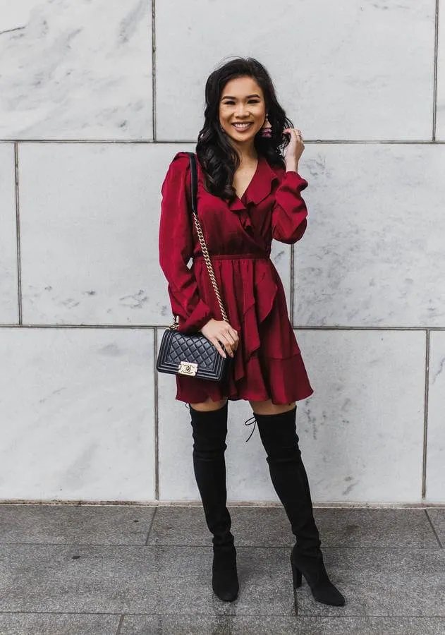 Ruffle dress in winter - why not? You can style this red dress with thigh-high boots and add crossbody bag. This combo is perfect for clubs, parties, and other special occasions. #cluboutfit #highboots