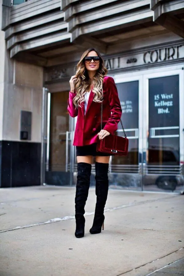 Velvet adds a luxurious and posh look to every outfit combination. Combine this statement red blazer and thigh-high boots combo for a Saturday night out. #cluboutfit #highboots