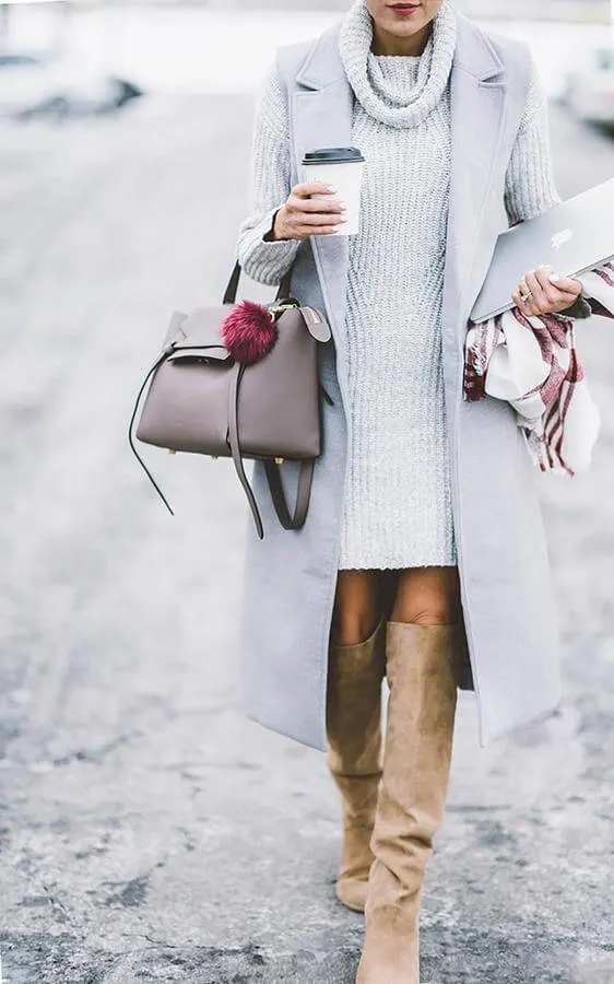 Grey knit dress is combined with a tailored vest in the same shade. You don’t need to choose between wearing tights or leaving your legs bare - tall boots will keep you warm all the time. #highboots