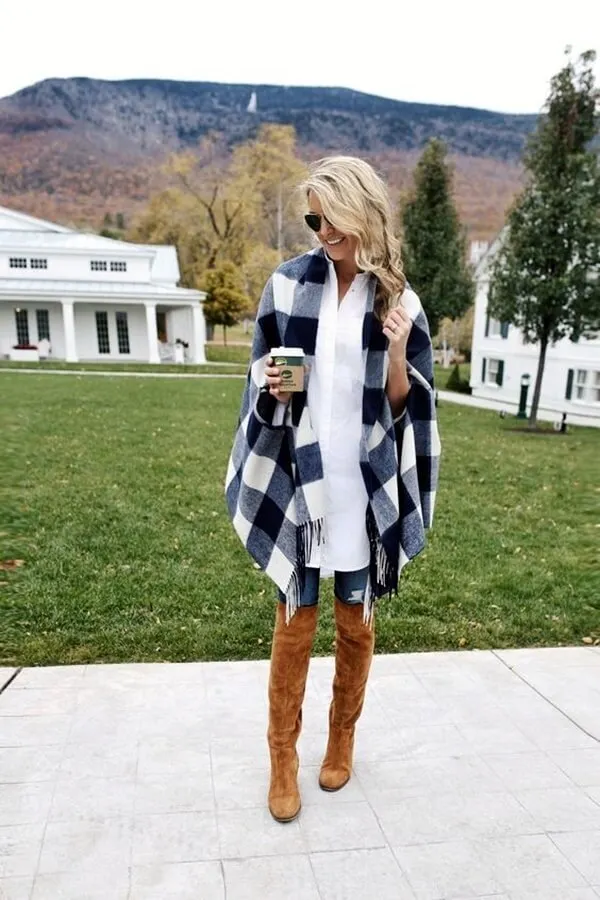 Make sure to have at least one poncho in your closet. It will keep you warm and very fashionable at the same time - wear it with jeans and brown thigh-high boots. #highboots