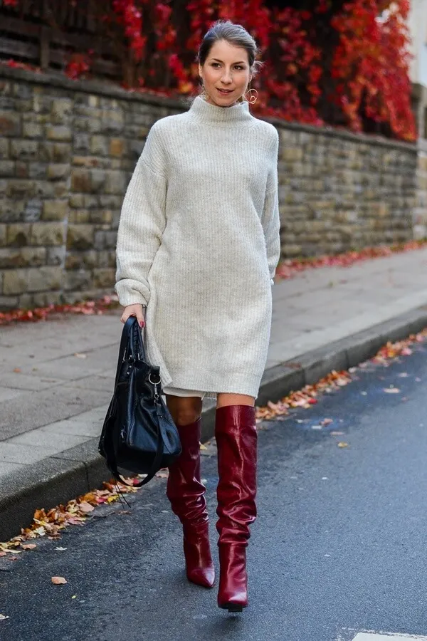 Red slouchy boots a la Isabel Marant perfectly work with an oversized sweater dress. If you are looking for something to wear on a daily basis, then this should be your first choice. #highboots