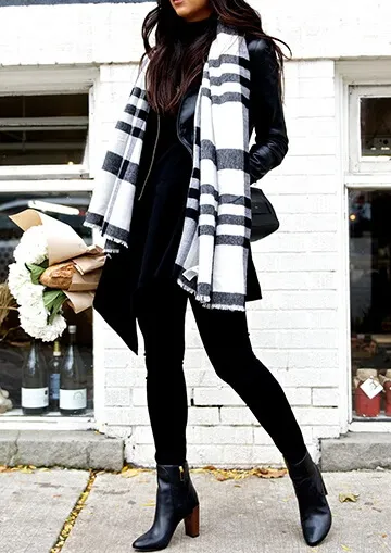 Black from top to toe is every true fashionista’s secret weapon. Throw in a bit of preppy appeal by wrapping up in a large plaid scarf for extra style points.