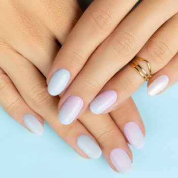 Woman's hands with trendy ombré nails