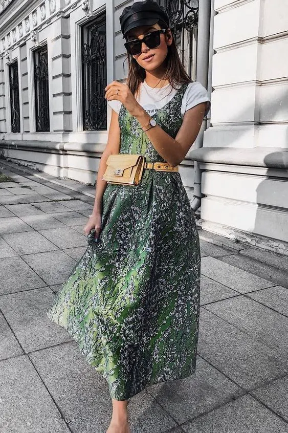 The floral dress might sound boring, but you can upgrade it with a T-shirt and belt bag.