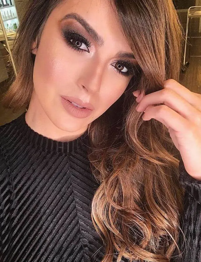 A dark smokey eye looks all sorts of amazing with your side-swept bangs!