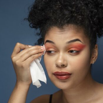 Woman removing her make-up-with-make-up with a remover tissue