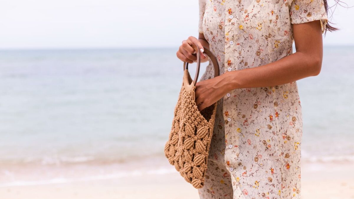 Woman knitted bag beach