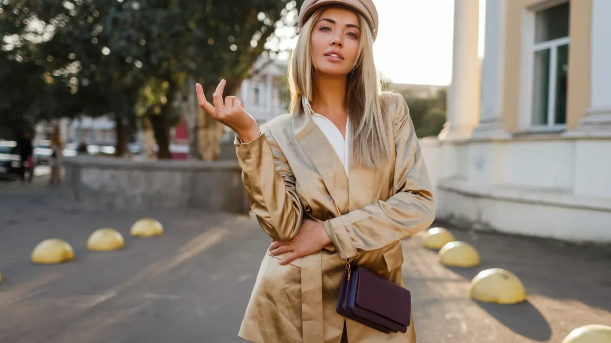 Elegant blond woman with leather hat & casual beige jacket