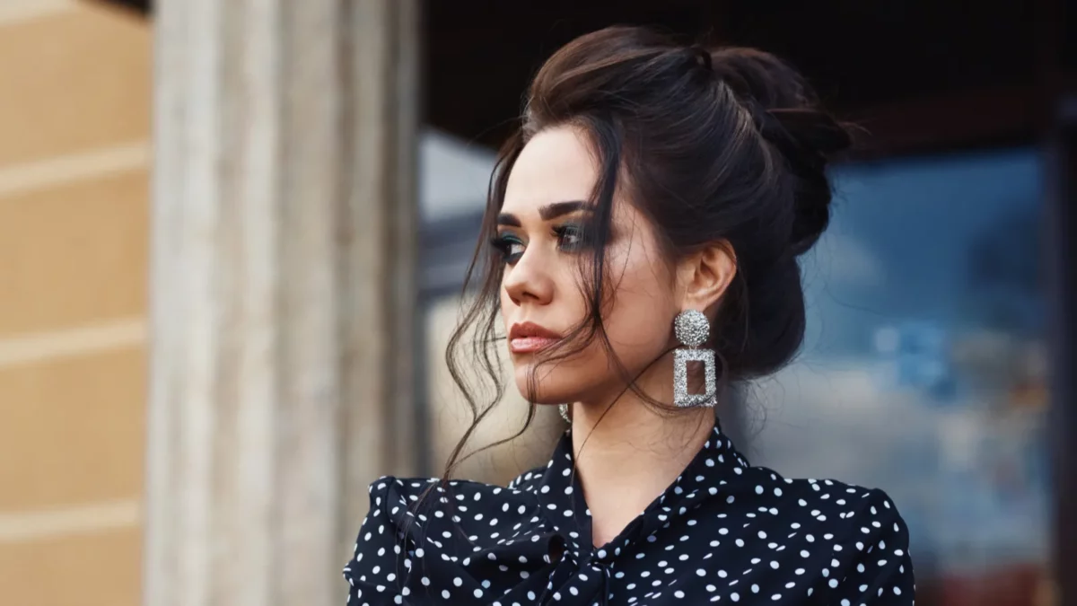 An elegant woman with earrings