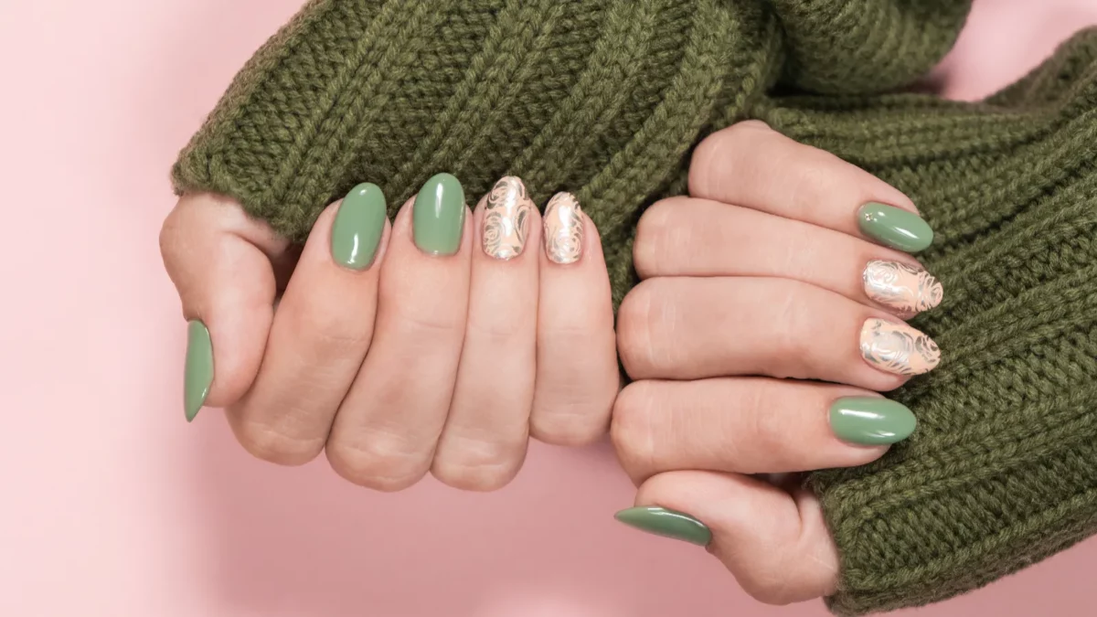 Beautiful two faded colors trendy manicure of green and pink nails
