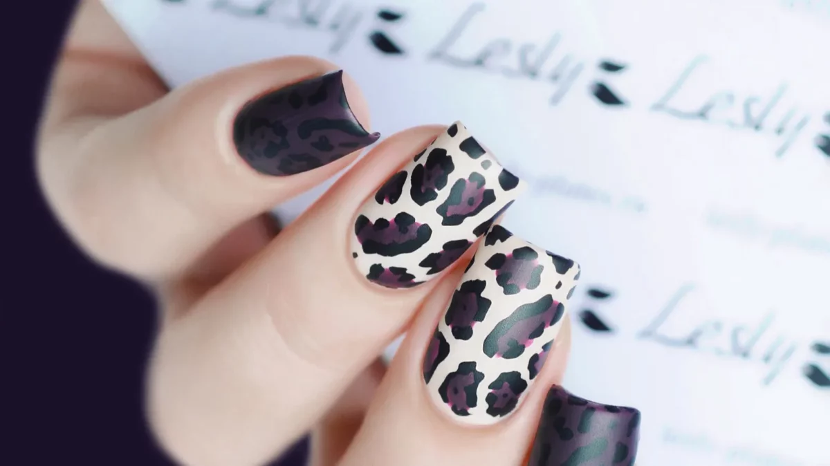 Purple manicure with animal print