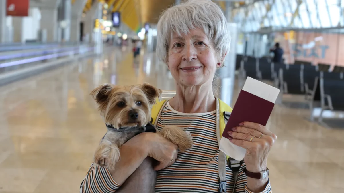 Senior woman traveling with her dog