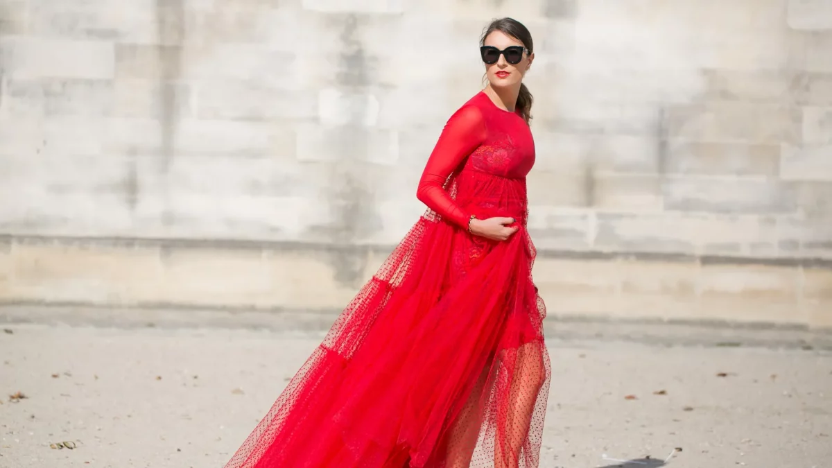 Woman in red fringe dress