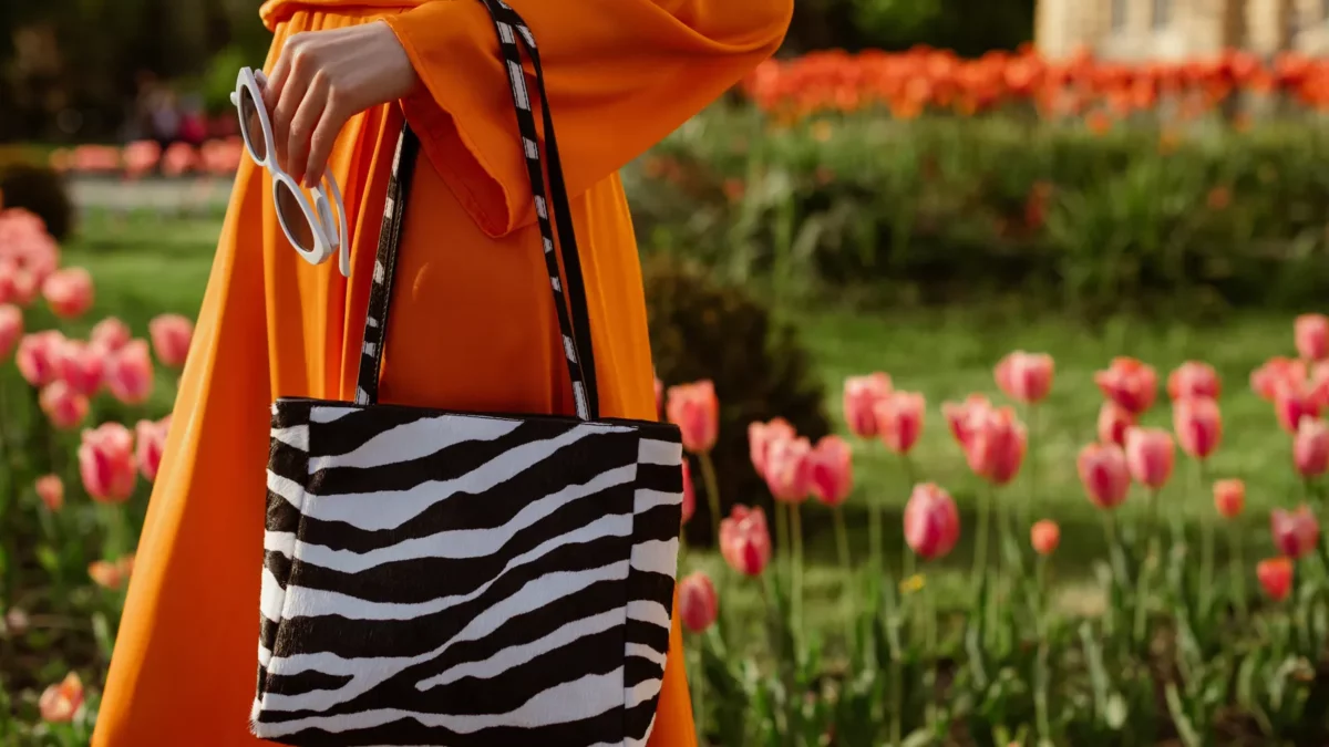 Woman with zebra print leather bag