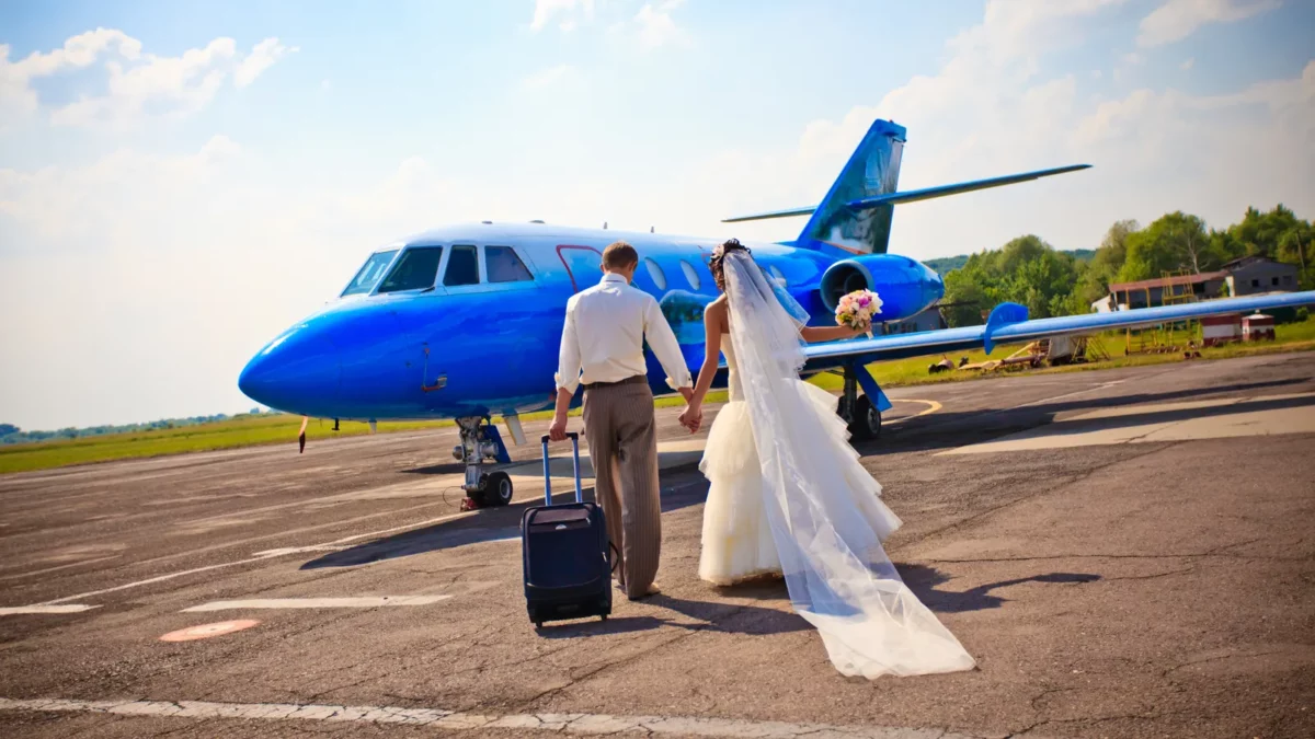 Wedding couple are prepare to fly